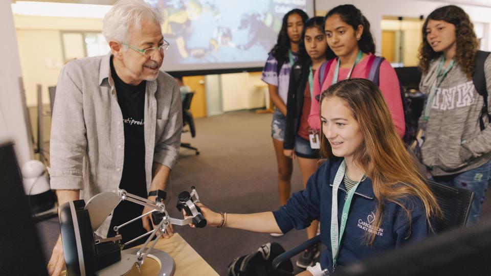 Participants explore in the Stanford Robotics Lab